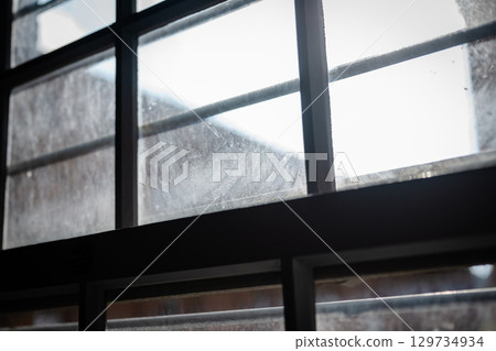 Cloudy window Cloudy window 129734934