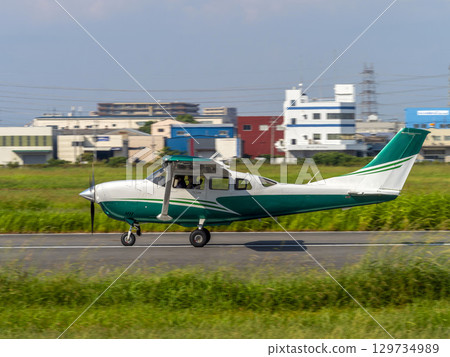 A light aircraft landing at Yao Airport A light aircraft landing at Yao Airport 129734989
