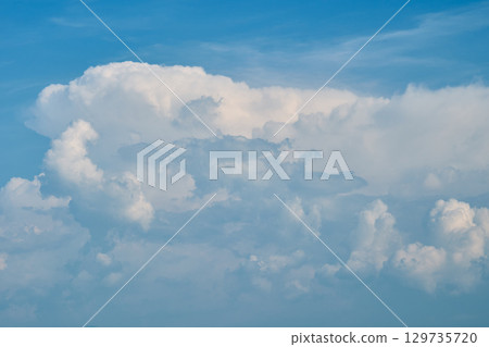 Summer sky background material. White clouds floating in the blue sky Summer sky background material. White clouds floating in the blue sky 129735720