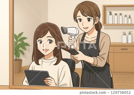 The finishing touches at a hair salon, when a stylist dries your hair with a hairdryer. 129736052