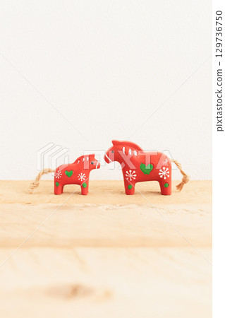 A cute New Year's card for the Year of the Horse, featuring a red horse that brings happiness 129736750