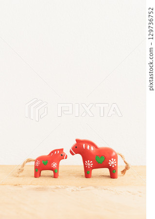 A cute New Year's card for the Year of the Horse, featuring a red horse that brings happiness 129736752