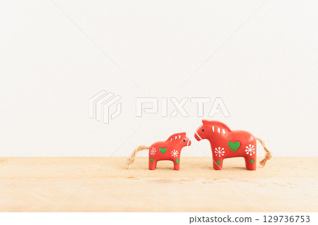 A cute New Year's card for the Year of the Horse, featuring a red horse that brings happiness 129736753