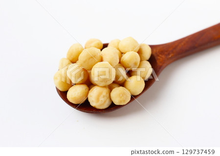 Deliciously salted roasted macadamia nuts Deliciously salted roasted macadamia nuts 129737459