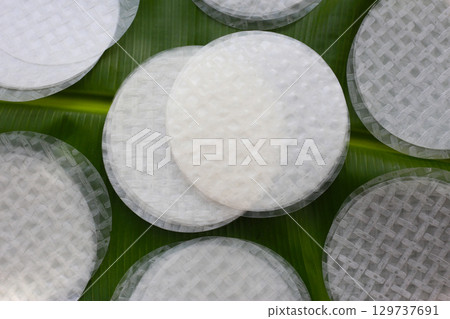 Stacked round sheets of Vietnamese rice paper 129737691