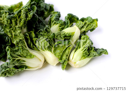 Fresh baby bok choy with crisp white green leaves. Fresh baby bok choy with crisp white green leaves. 129737715