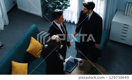 Top view of diverse people present financial chart to investor. Directorate. Top view of diverse people present financial chart to investor. Directorate. 129738649