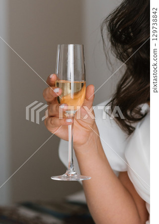 Bride Holding Champagne Glass In Hand Bride Holding Champagne Glass In Hand 129738842