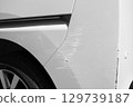 Damaged rear of car, auto repair, scratches 129739187