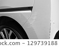 Damaged rear of car, auto repair, scratches 129739188