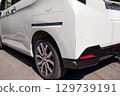 Damaged rear of car, auto repair, scratches 129739191