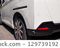 Damaged rear of car, auto repair, scratches 129739192