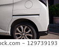 Damaged rear of car, auto repair, scratches 129739193