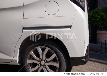 Damaged rear of car, auto repair, scratches Damaged rear of car, auto repair, scratches 129739193