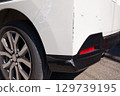 Damaged rear of car, auto repair, scratches 129739195