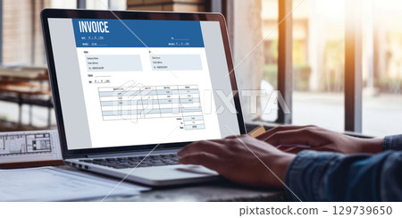 Invoice on computer screen from accounting application. brisk. 129739650