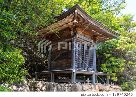 Small wooden temple on Mount Misen trail, Miyajima Island, Japan 129740246