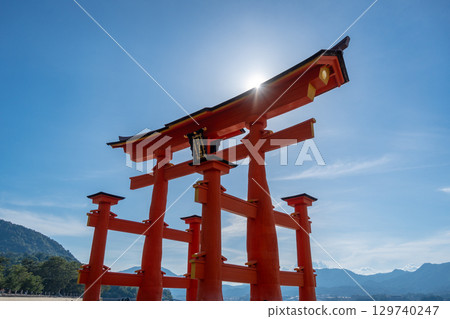 Close-up view of the famous Itsukushima shrine red torii gate in Miyajima, Japan Close-up view of the famous Itsukushima shrine red torii gate in Miyajima, Japan 129740247