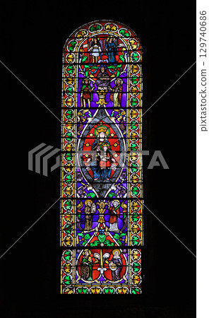 Stained glass window of Chapel Notre-Dame in Rocamadour, France with biblical scenes 129740686