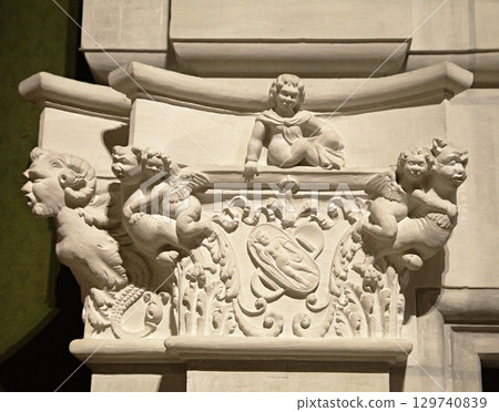 Intricate stone carvings of cherubs and mythical creatures at Chambord Castle in France 129740839