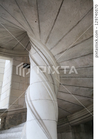 Intricate spiral staircase detail of Chambord Castle in France 129740870