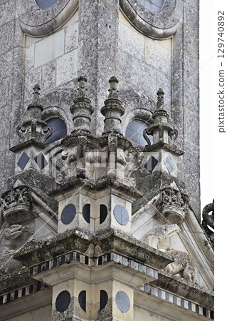 Chambord castle with intricate details in France's Loire Valley during a cloudy day 129740892