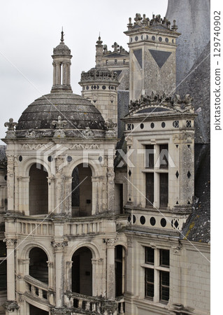 Chambord castle with intricate details in France's Loire Valley during a cloudy day 129740902