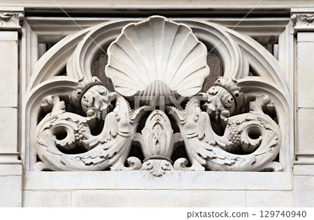 Intricate stone sculpture featuring sea creatures in Blois, France 129740940