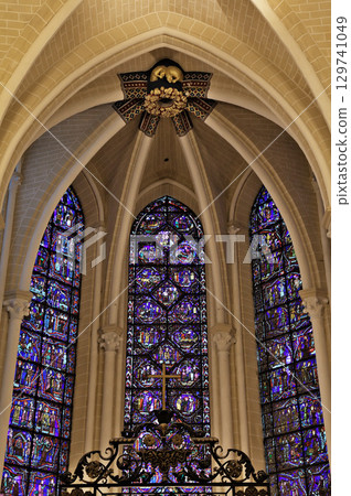 Stunning stained glass windows brighten the interior of Notre-Dame de Chartres Cathedral Stunning stained glass windows brighten the interior of Notre-Dame de Chartres Cathedral 129741049