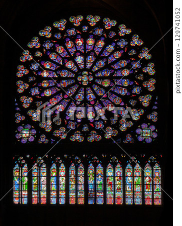 PARIS - OCTOBER 25, 2016: South rose window of Notre Dame cathedral PARIS - OCTOBER 25, 2016: South rose window of Notre Dame cathedral 129741052