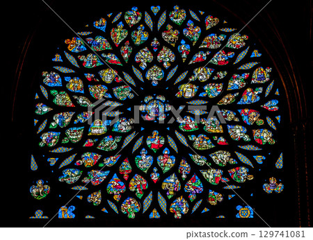 Stained glass rose window of Sainte-Chapelle, vibrant colors and intricate designs, interior Stained glass rose window of Sainte-Chapelle, vibrant colors and intricate designs, interior 129741081