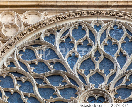Intricate stained glass window of Sainte-Chapelle in Paris, Gothic architecture, exterior 129741085