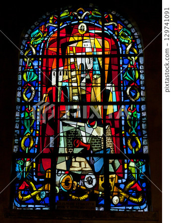 Paris, France - October 27, 2016 - Stained glass window of Eglise Saint-Pierre de Montmartre in Paris Paris, France - October 27, 2016 - Stained glass window of Eglise Saint-Pierre de Montmartre in Paris 129741091