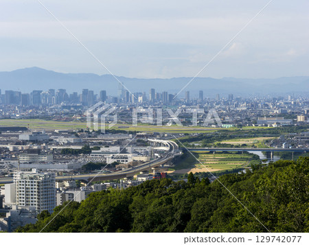 View of the Inagawa River and the Osaka cityscape from a high vantage point 129742077