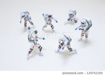 Group of Miniature Astronaut Figures in Space Exploration Suits Group of Miniature Astronaut Figures in Space Exploration Suits 129742200