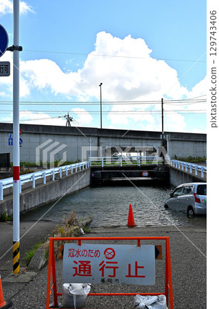 Underpass road flooded and closed due to heavy rain 129743406