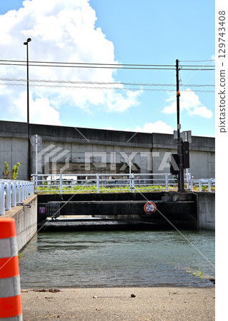 Underpass road flooded and closed due to heavy rain 129743408