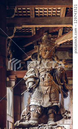 Wooden statue of Komokuten guardian at Todai ji Temple Nara 129743521