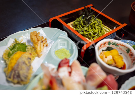 Japanese kaiseki meal with soba noodles tempura and sides Japanese kaiseki meal with soba noodles tempura and sides 129743548