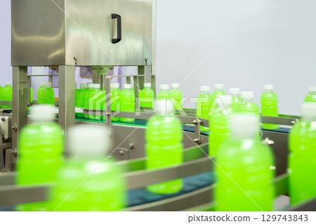 Line for the production and bottle of juice or water. Conveyor of food industry. Line for the production and bottle of juice or water. Conveyor of food industry. 129743843