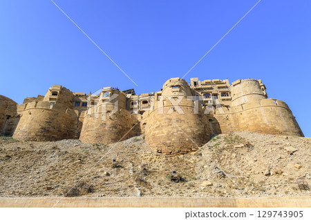 Looking up at the walls of Jaisalmer Fort Looking up at the walls of Jaisalmer Fort 129743905