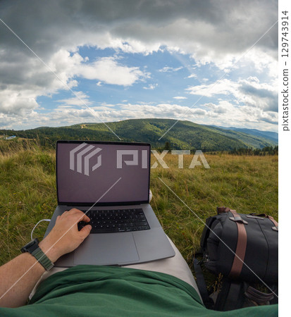 Remote Work in Scenic Mountain Landscape 129743914