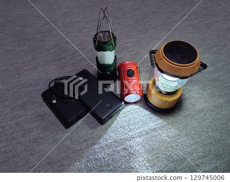 Mobile battery and lantern (center) for use in emergencies 129745006