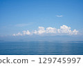 Clouds floating in the sea 129745997