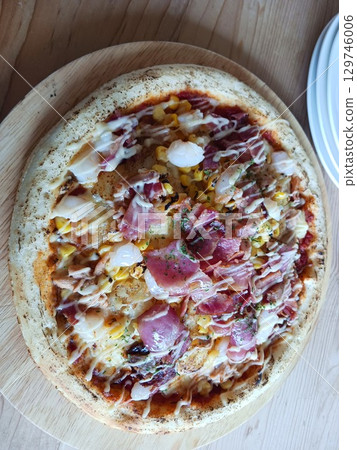 Luxurious seafood and bacon pizza Luxurious seafood and bacon pizza 129746006