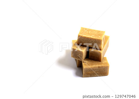 caramel candy close up on white background 129747046