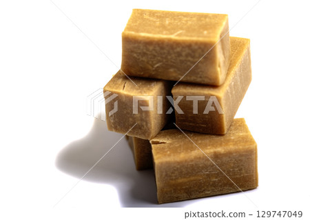 caramel candy close up on white background caramel candy close up on white background 129747049