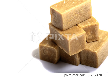 caramel candy close up on white background 129747066