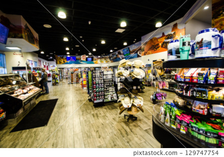Blurred image of the interior of a convenience store attached to a gas station in Utah, USA Blurred image of the interior of a convenience store attached to a gas station in Utah, USA 129747754