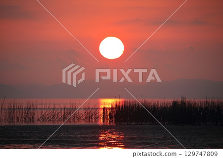 Arao City coast at dusk 129747809